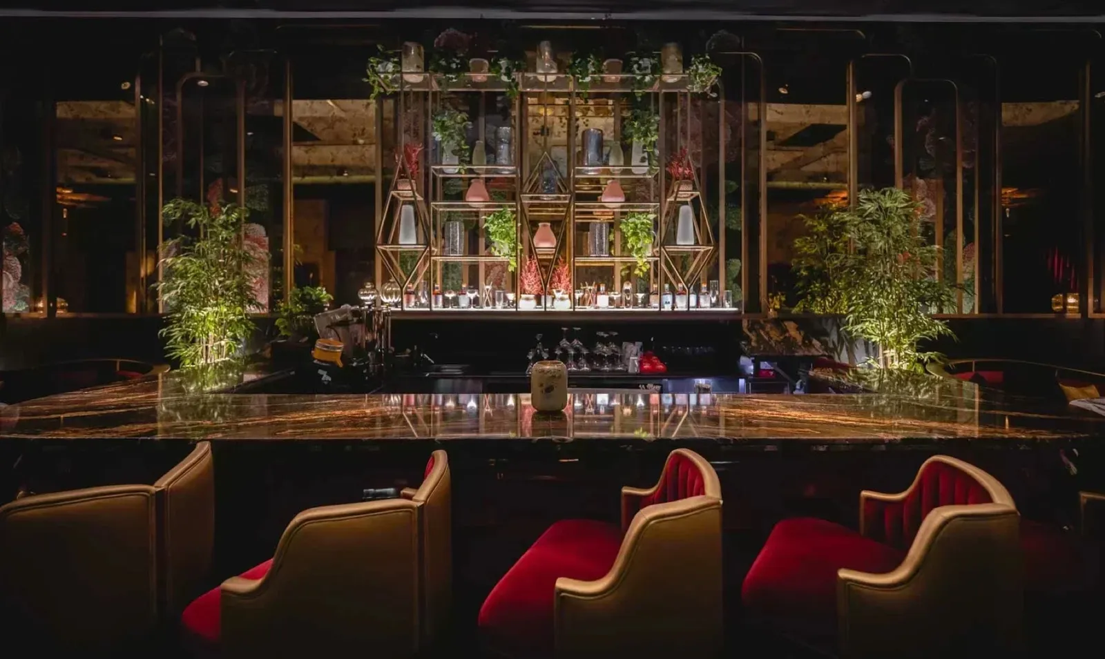 Bar with red velvet seating.